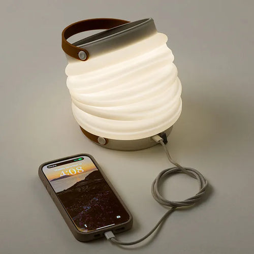 3-in-1 Solar Lantern & Power Bank Illuminate every trip and adventure with this collapsible lantern-flashlight-power bank that recharges via solar panel or USB-C.